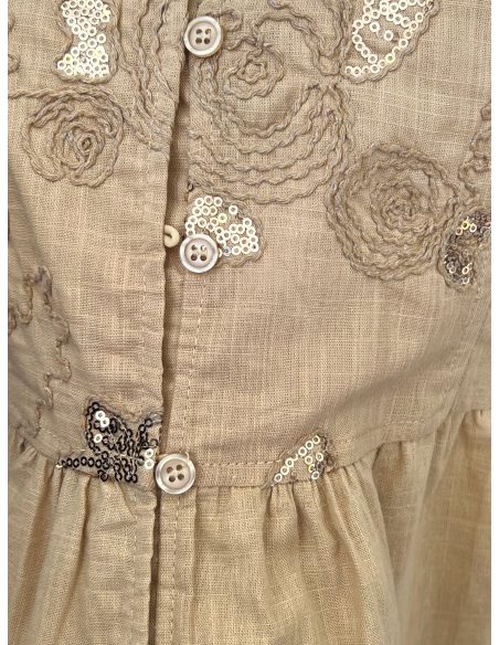 Blusa peplum bordado y escote pico