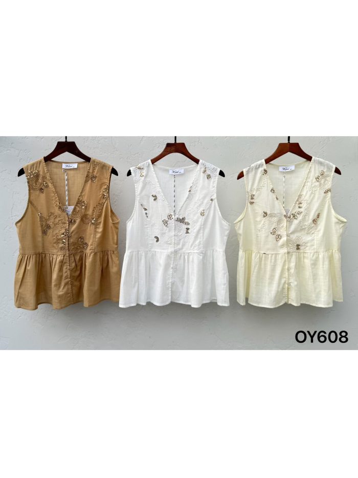 Blusa peplum bordado y escote pico