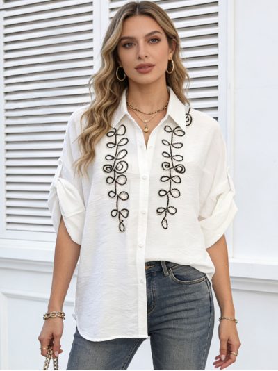 Camisa bordada de hojas