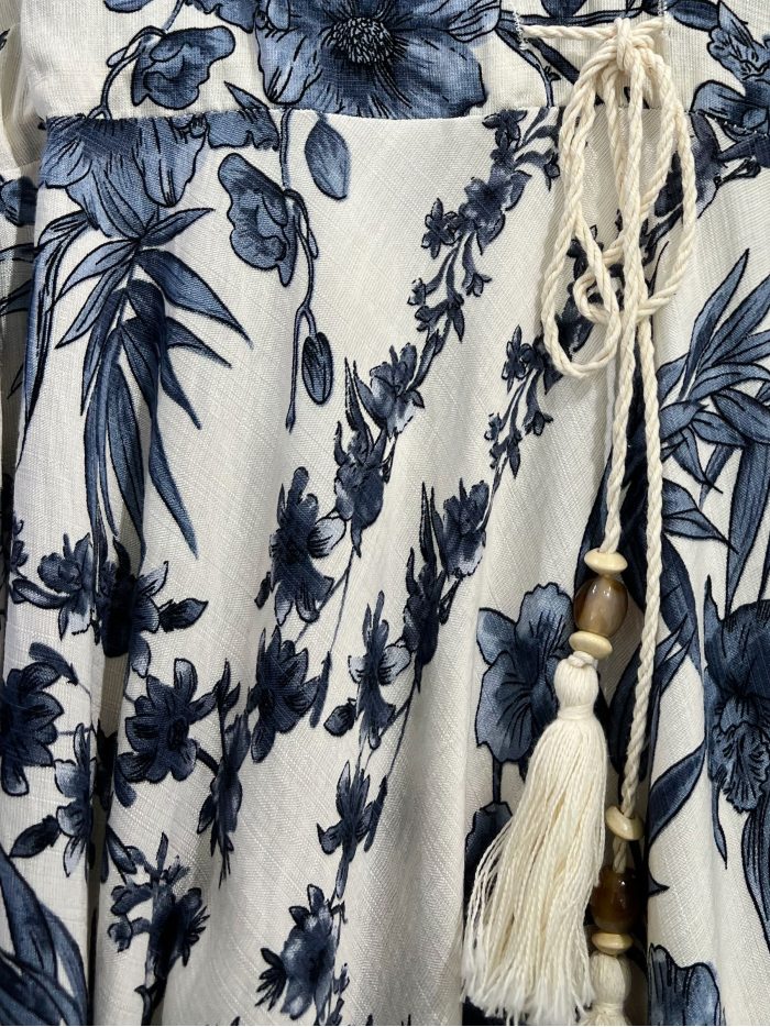 Abito midi con stampa floreale e fiocco con nappe