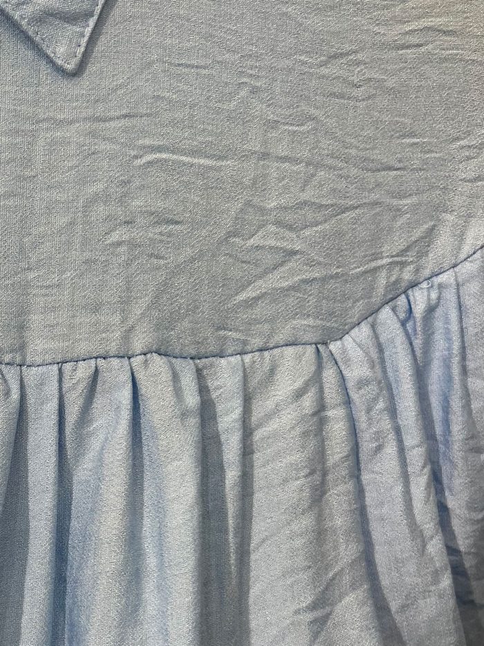 Conjunto camisa de manga corta y falda