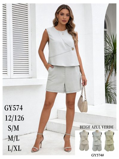 Completo composto da camicetta senza maniche con bottone a fiore e pantaloncini 2