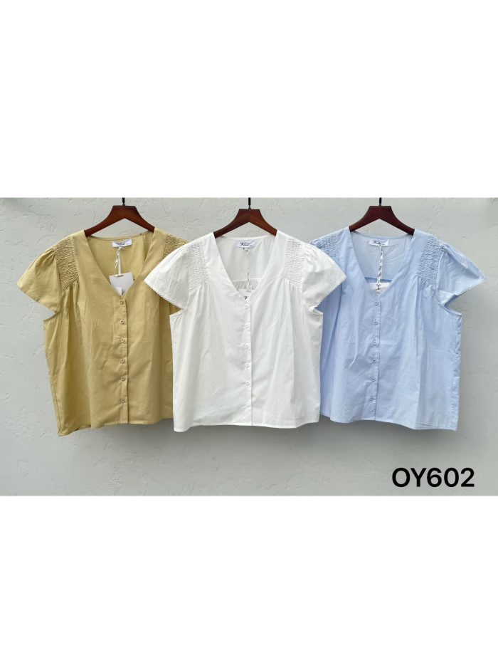 Blouse à col en V et détails froncés