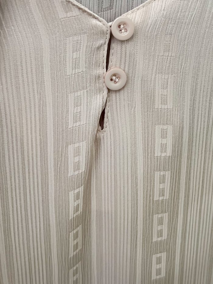 Blusa textura manga volantes