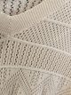 Maglione traforato in maglia fine con scollo a V