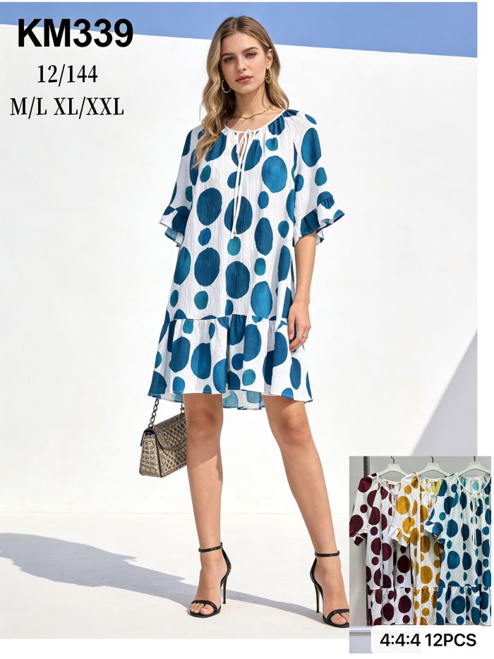 Vestido corto amplio de lunares con bajo volante