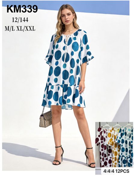 Vestido corto amplio de lunares con bajo volante