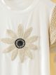 Maglietta con fiore all'uncinetto
