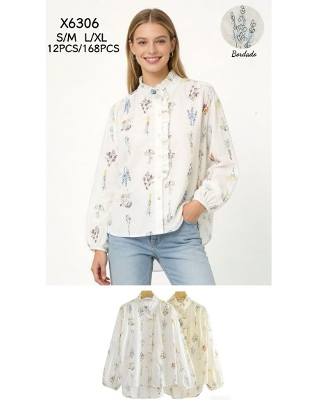 Chemisier brodé de fleurs avec volant sur le devant