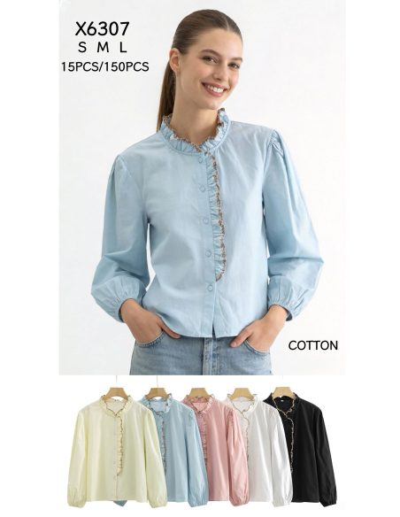 Chemisier uni à volant contrastant