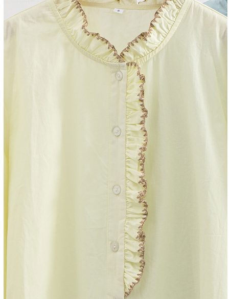 Chemisier uni à volant contrastant