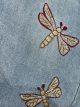 Jeans pirata bordados con libélulas