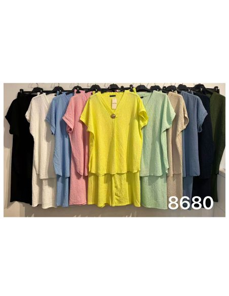 Conjunto blusa textura botón joya y pantalón