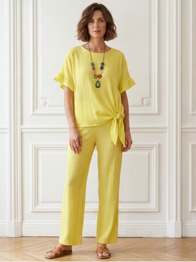 Conjunto de blusa e calça com textura e nó