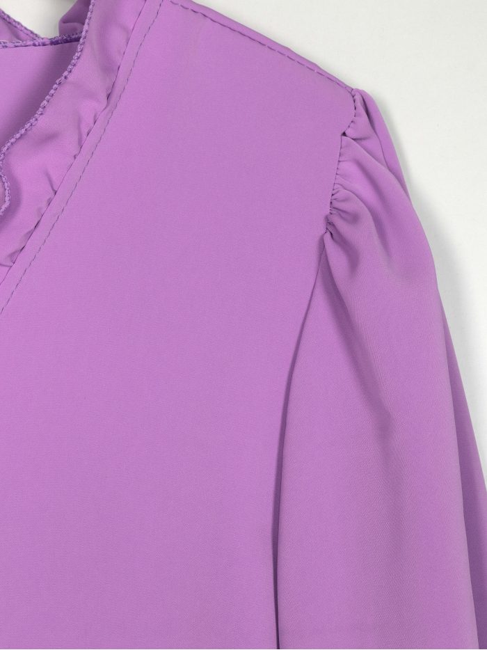 Zweifarbige Bluse mit Rüschen