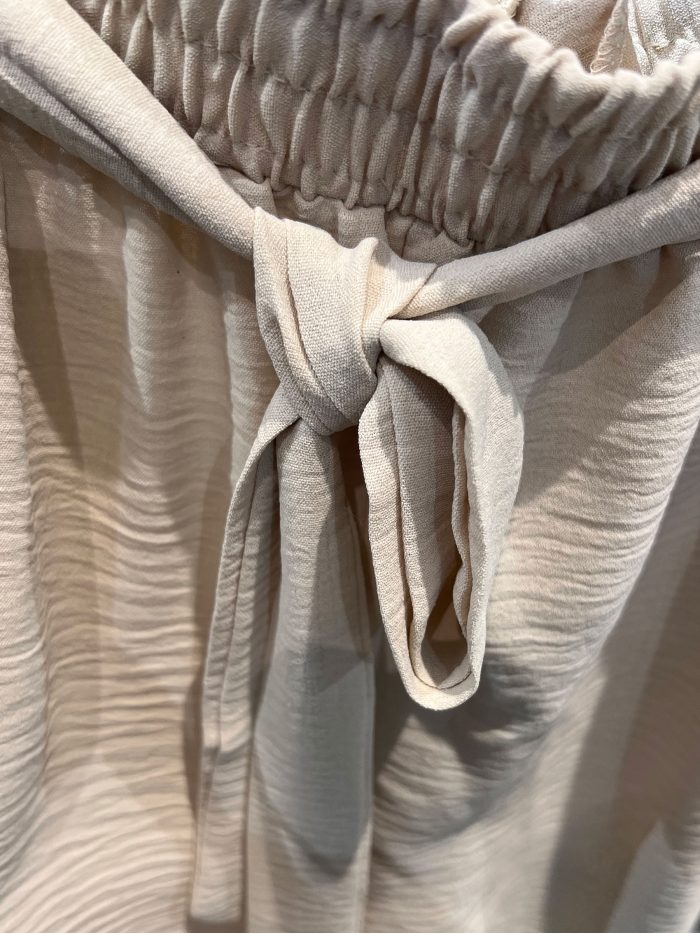 Pantaloncini fluidi con laccetto e tasche