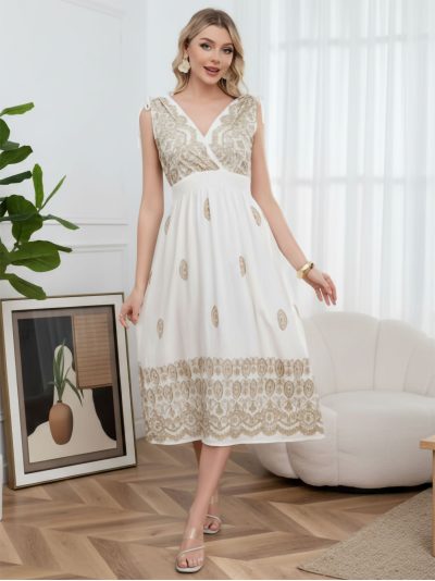 Vestido midi bordado con lazadas en hombros