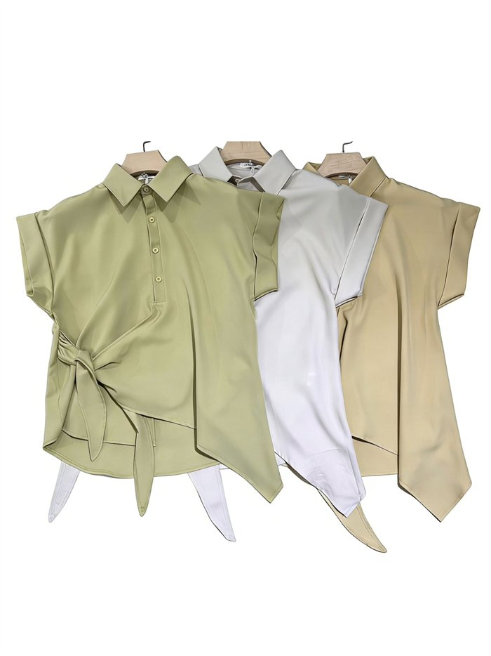 Completo blusa e pantaloni asimmetrici