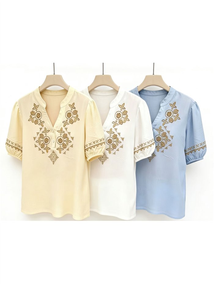 Blusa bordada con manga fruncida