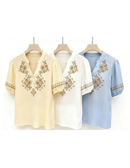 Blusa bordada con manga fruncida