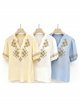 Blusa bordada con manga fruncida