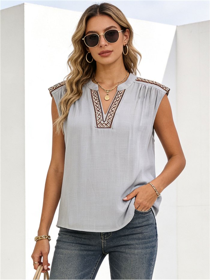 blouse brodée sans manches