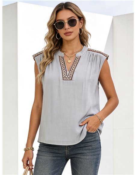 blouse brodée sans manches
