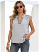 blouse brodée sans manches
