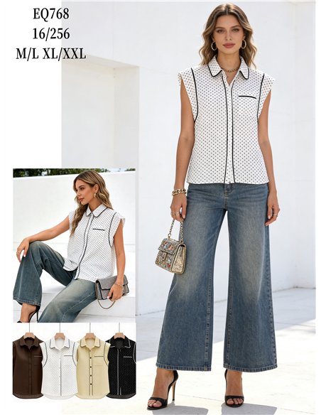 Blusa sem mangas com estampa de bolinhas e detalhes contrastantes.