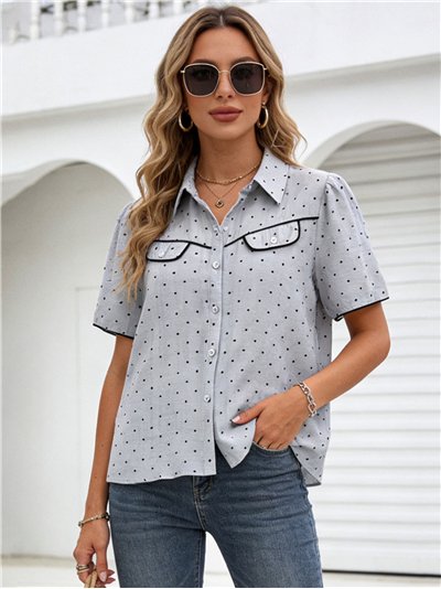 Camisa lunares con ribetes en contraste