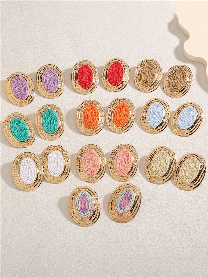 Pendientes ovalados con marco dorado