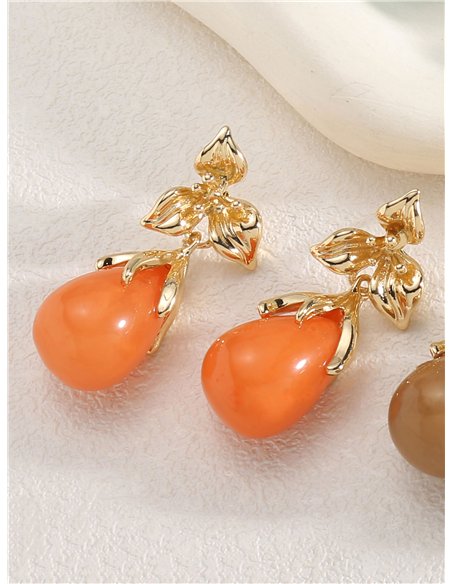 Pendientes flor dorada con gota de resina