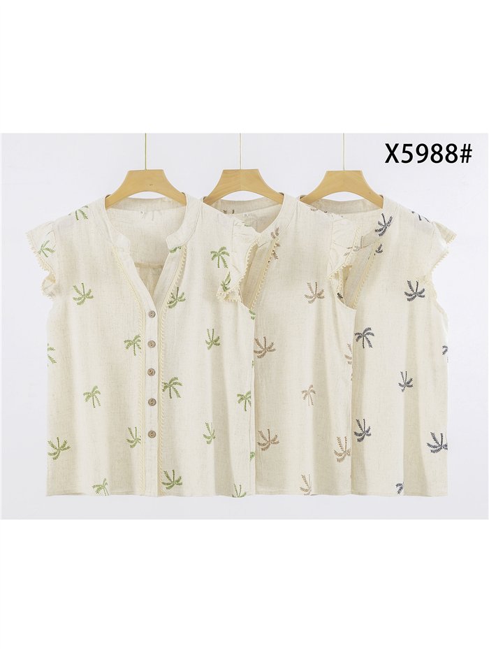Blusa bordada con palmeras y volante