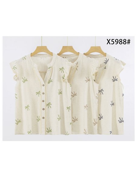 Blusa bordada con palmeras y volante