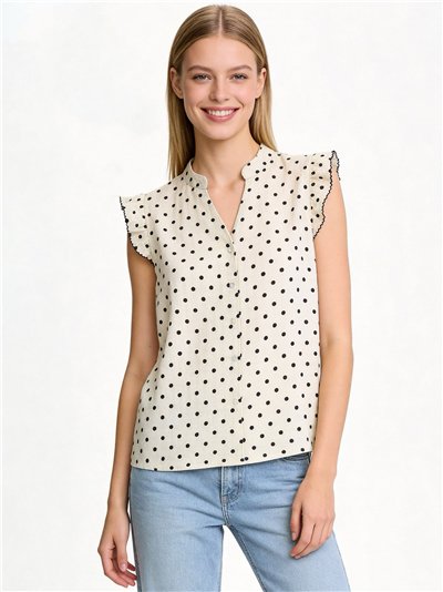 Blusa de bolinhas com babado