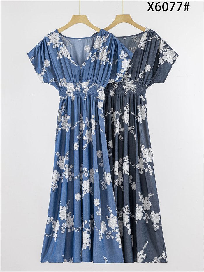 Vestido midi bordado floral con cintura fruncida