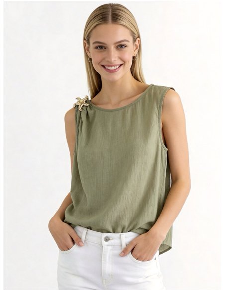 Top sin mangas con broche estrella de mar