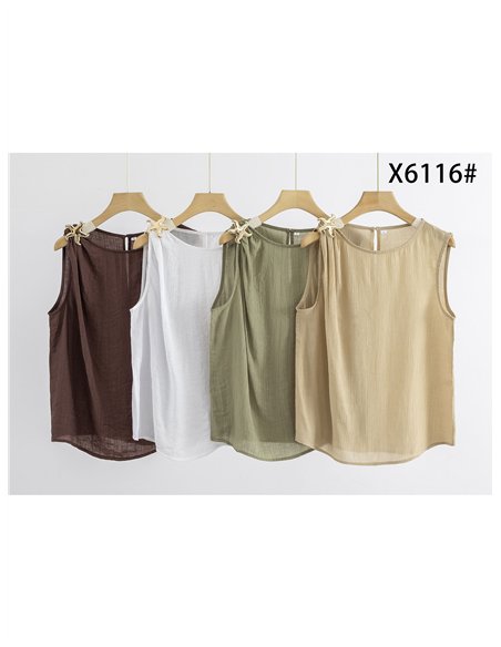 Top sin mangas con broche estrella de mar