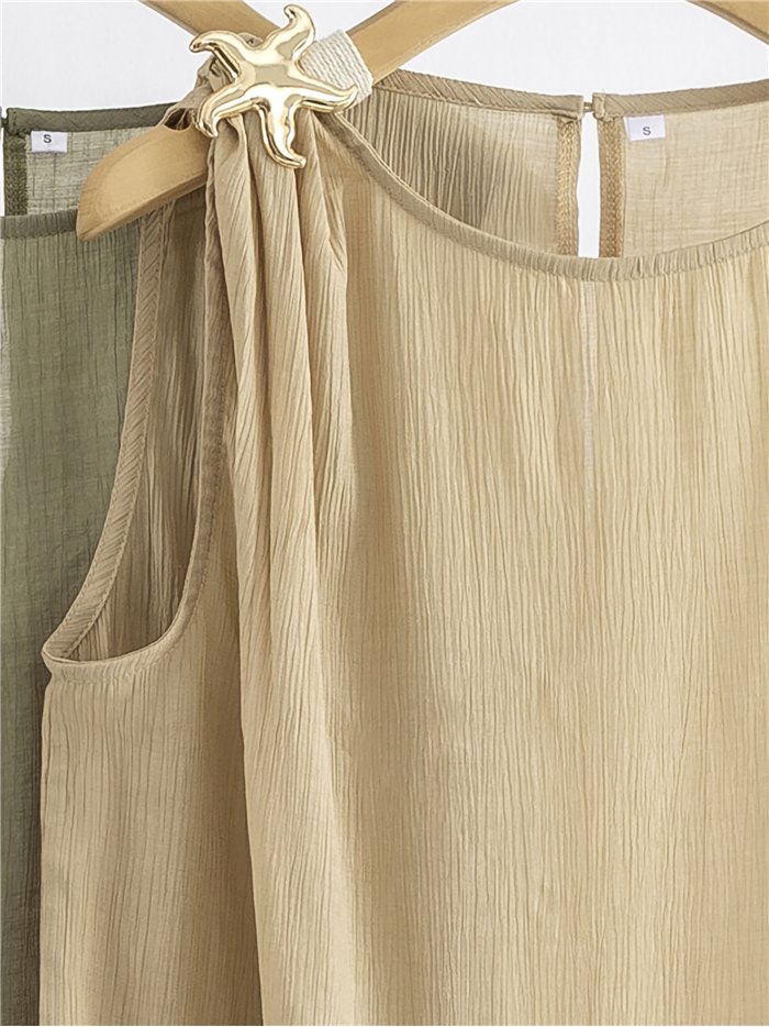 Top sin mangas con broche estrella de mar