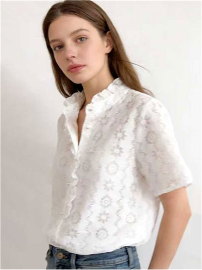 Blusa de encaje con volante
