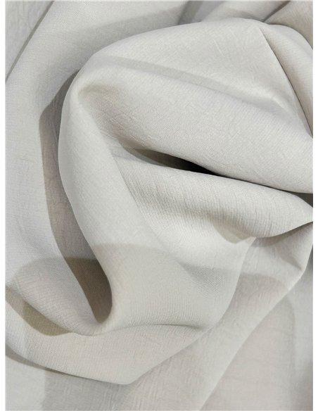 Completo composto da gilet con taschino sul risvolto e pantaloni a gamba larga.