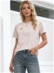 T-shirt con applicazione floreale all'uncinetto