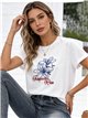 Camiseta bordada floral tropical