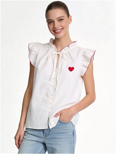 Blusa de algodón con corazón bordado y volante