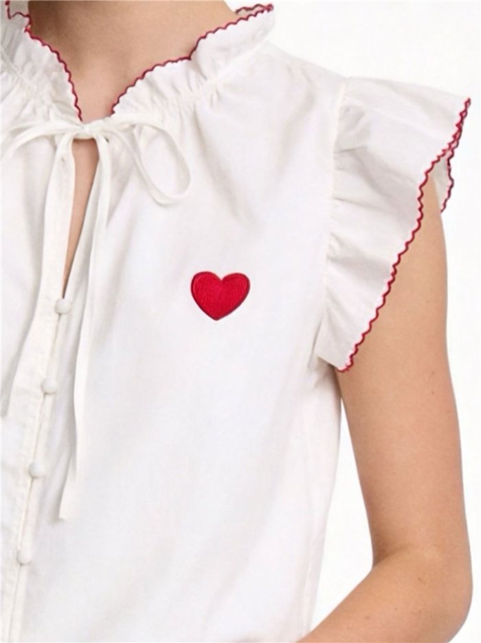 Camicetta in cotone con cuore ricamato e volant.