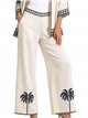 Pantalón de lino con bordado de palmeras