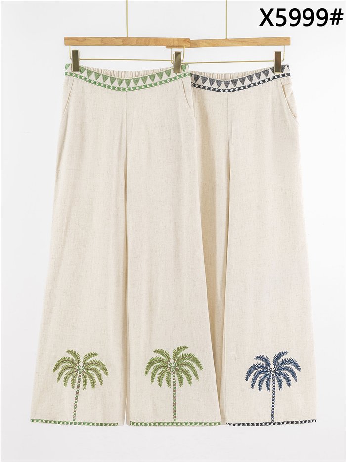 Pantalón de lino con bordado de palmeras