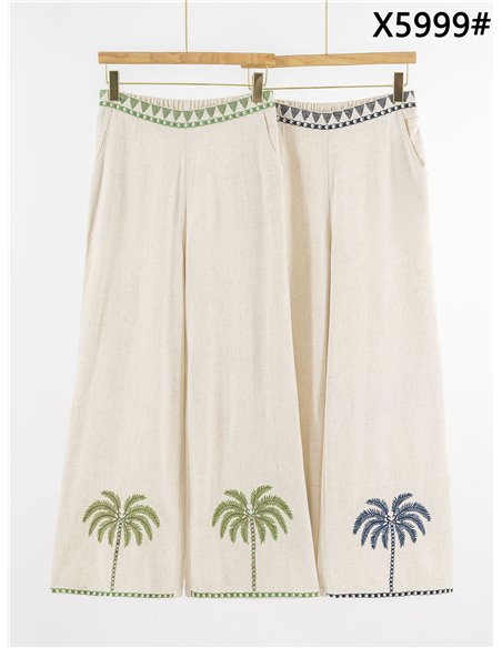 Pantalón de lino con bordado de palmeras
