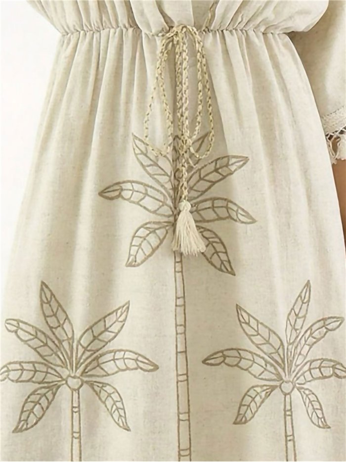 Vestido caftán de lino con palmeras bordadas