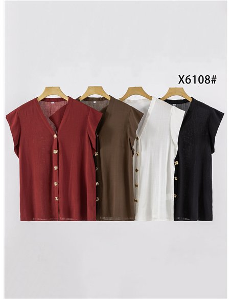 Blusa de lino talla grande con botones joya